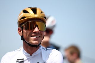 Soudal Quick-Step's Belgian rider Remco Evenepoel wearing the best young rider's white jersey reacts prior to the 2nd stage of the 77th edition of the Criterium du Dauphine cycling race, 204,6 km between Prémilhat and Issoire, on June 9, 2025. (Photo by Anne-Christine POUJOULAT / AFP)