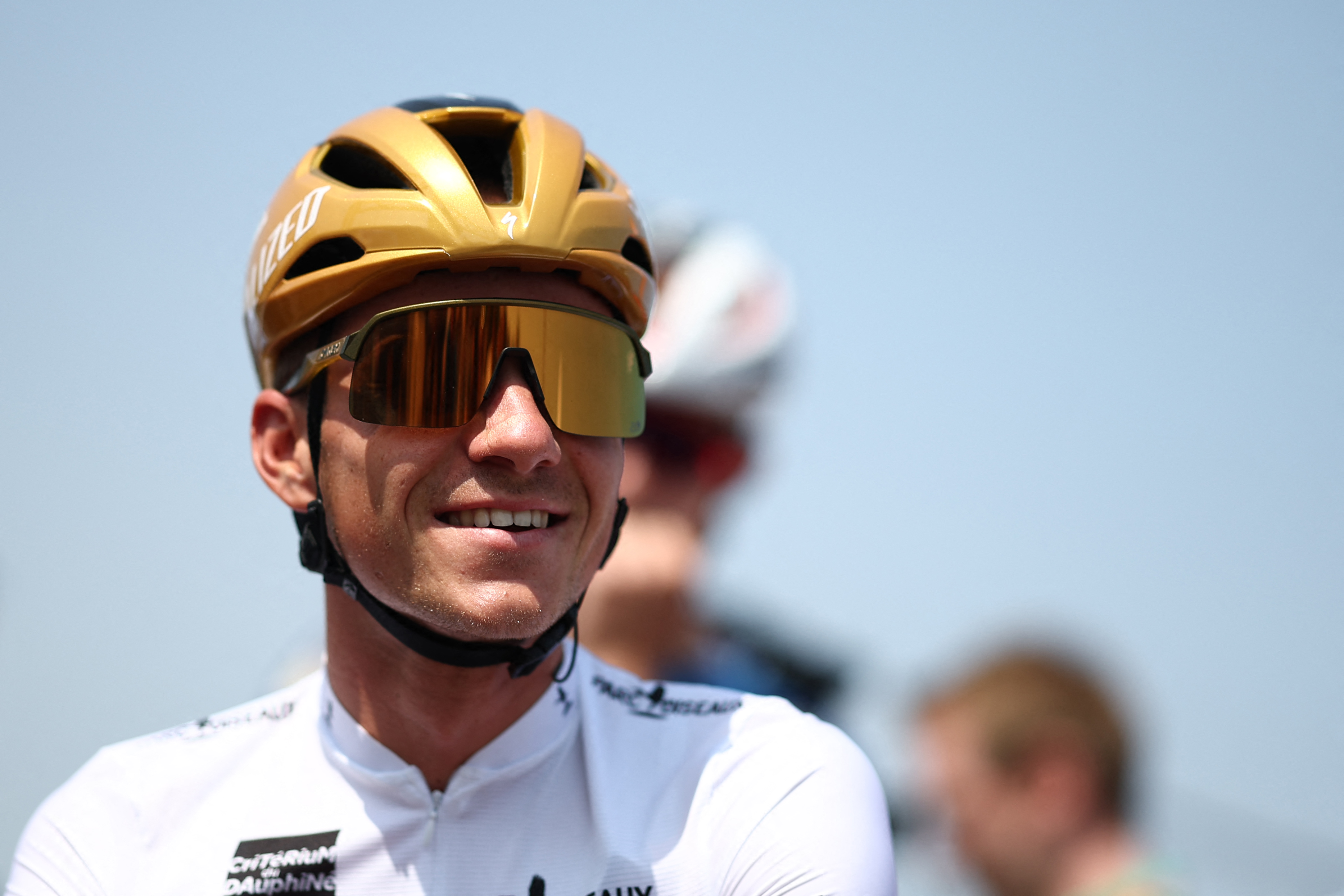 Soudal Quick-Step's Belgian rider Remco Evenepoel wearing the best young rider's white jersey reacts prior to the 2nd stage of the 77th edition of the Criterium du Dauphine cycling race, 204,6 km between PrÃ©milhat and Issoire, on June 9, 2025. (Photo by Anne-Christine POUJOULAT / AFP)