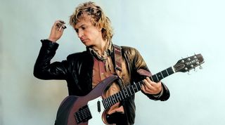 Portrait of the guitarist Andy Summers from The Police at the Hamer Guitar Factory in Arlington Heights, Illinois, March 30, 1982.