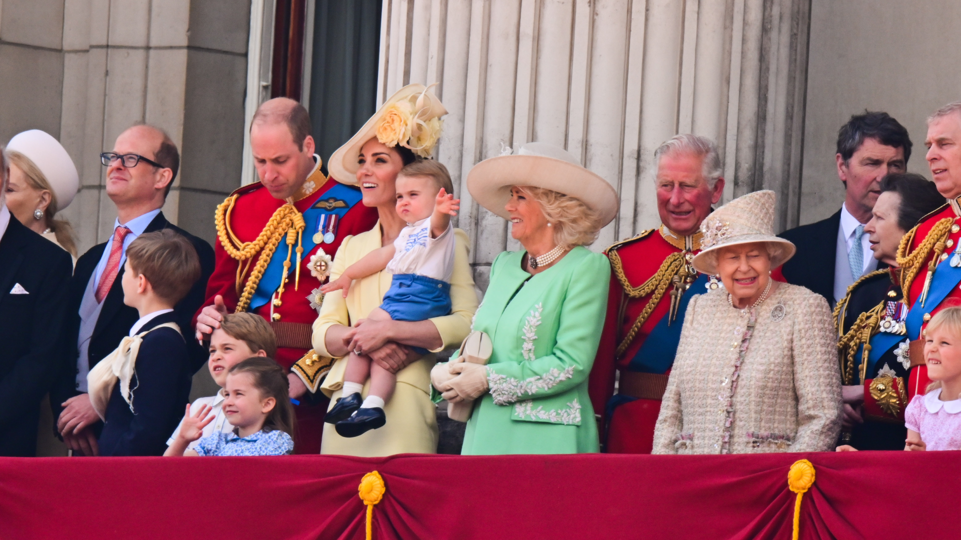 Members of the royal family on the balcony at Buckingham Palace including Queen Elizabeth, Prince William and Princess Kate, King Charles