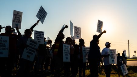 Unionized dockworkers strike at the Port of Houston on Oct. 1, 2024.