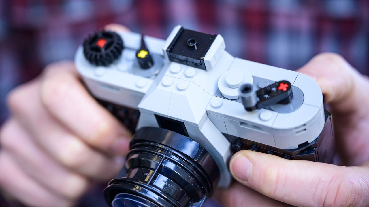 Close up of the top plate of the completed Lego Retro camera in the hand