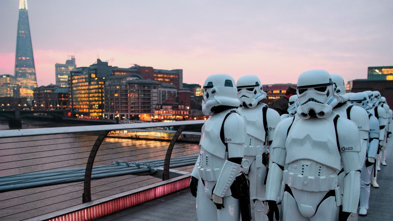 Stormtroopers pose on the Millennium Bridge in London to promote the release of Rogue One: A Star Wars Story