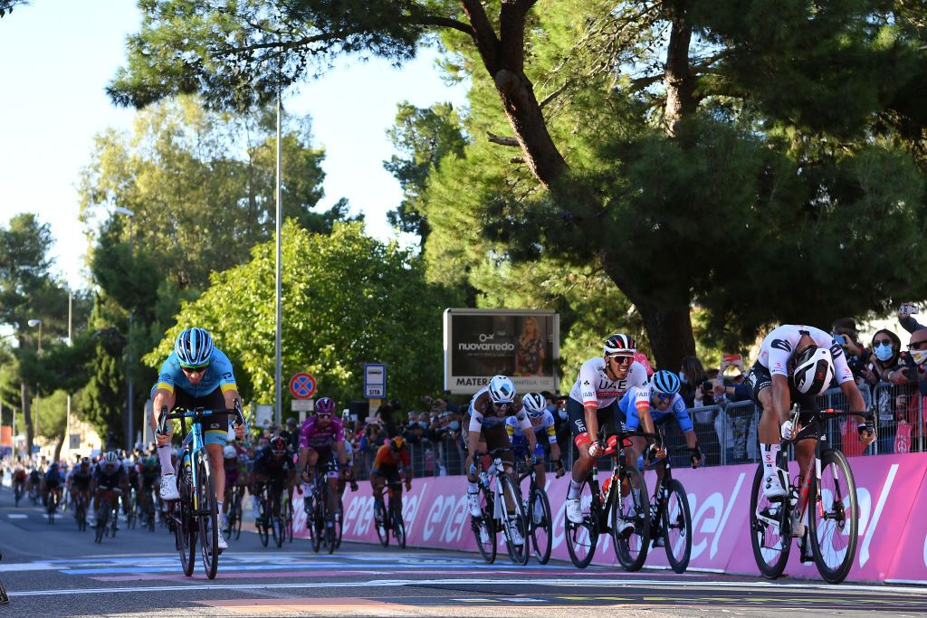 MATERA ITALY OCTOBER 08 Arrival Sprint Fabio Felline of Italy and Astana Pro Team Juan Sebastian Molano Benavides of Colombia and UAE Team Emirates Michael Matthews of Australia and Team Sunweb during the 103rd Giro dItalia 2020 Stage 6 a 188km stage from Castrovillari to Matera 401m girodiitalia Giro on October 08 2020 in Matera Italy Photo by Stuart FranklinGetty Images