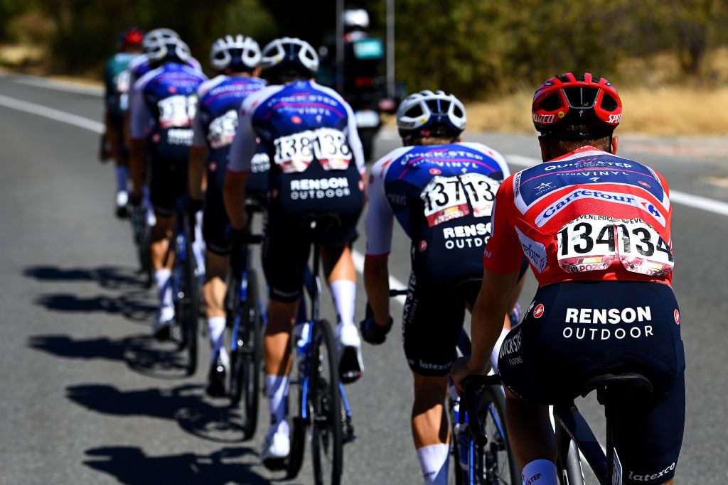 NAVACERRADA SPAIN SEPTEMBER 10 Remco Evenepoel of Belgium and Team QuickStep Alpha Vinyl Red Leader Jersey with teammates cduring the 77th Tour of Spain 2022 Stage 20 a 181km stage from Moralzarzal to Puerto de Navacerrada 1851m LaVuelta22 WorldTour on September 10 2022 in Puerto de Navacerrada Spain Photo by Tim de WaeleGetty Images