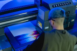Felipe Pantone working on a printing machine