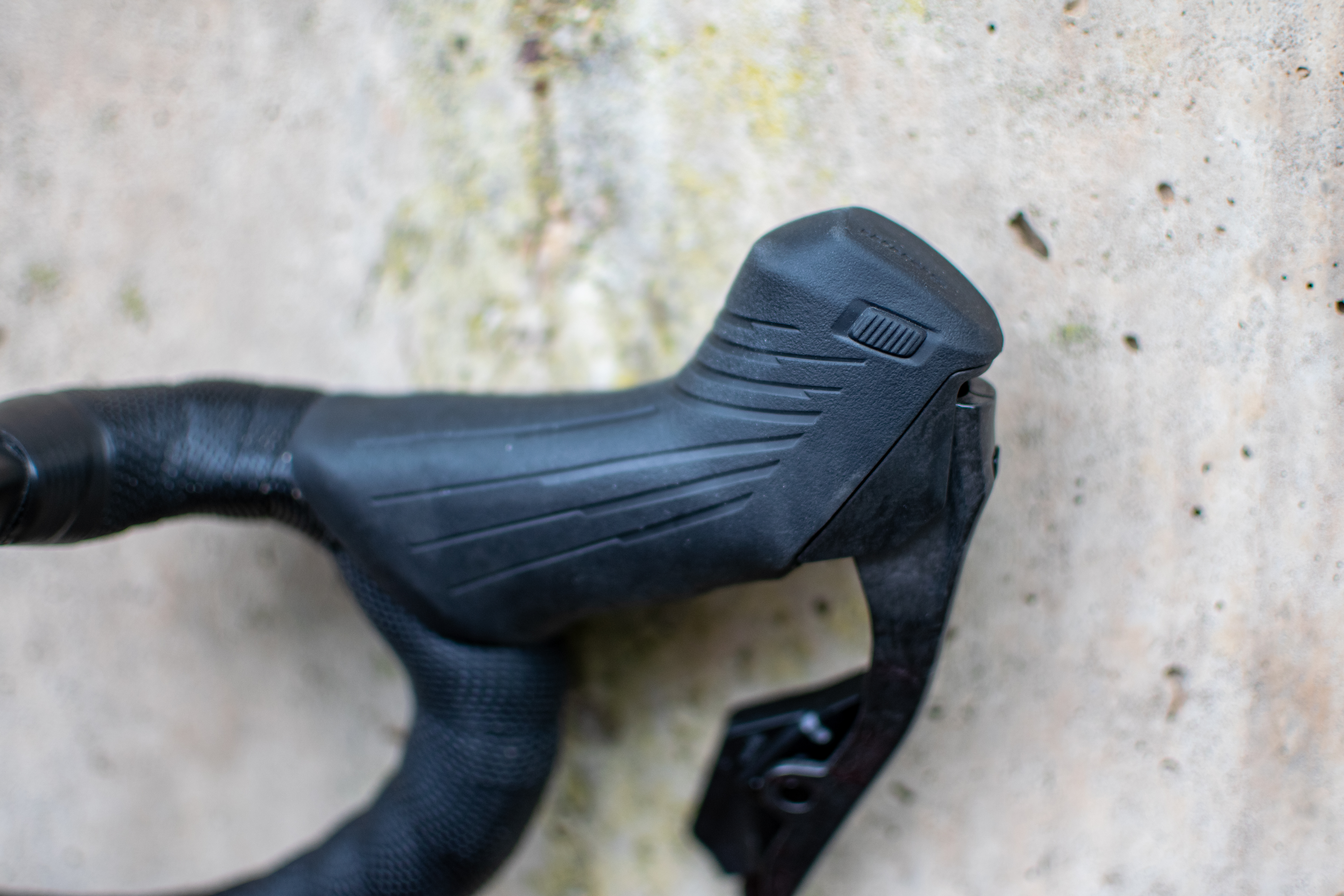 A SRAM Force AXS bonus shift button