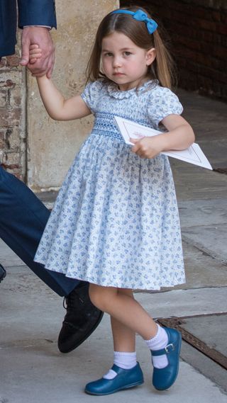 Princess Charlotte of Cambridge leaves after Prince Louis of Cambridge's christening at the Chapel Royal, St James's Palace, London on July 09, 2018 in London, England.