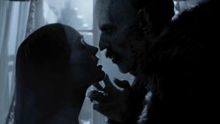 Bill Skarsgard's Count Orlock and Lilly Rose Depp's Ellen nearly kiss in a face-to-face scene in the 2024 film Nosferatu.