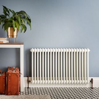 blue wall and white radiator