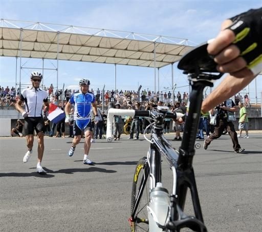 Riders run to grab their bikes and start the race on Saturday morning, in true Le Mans fashion.