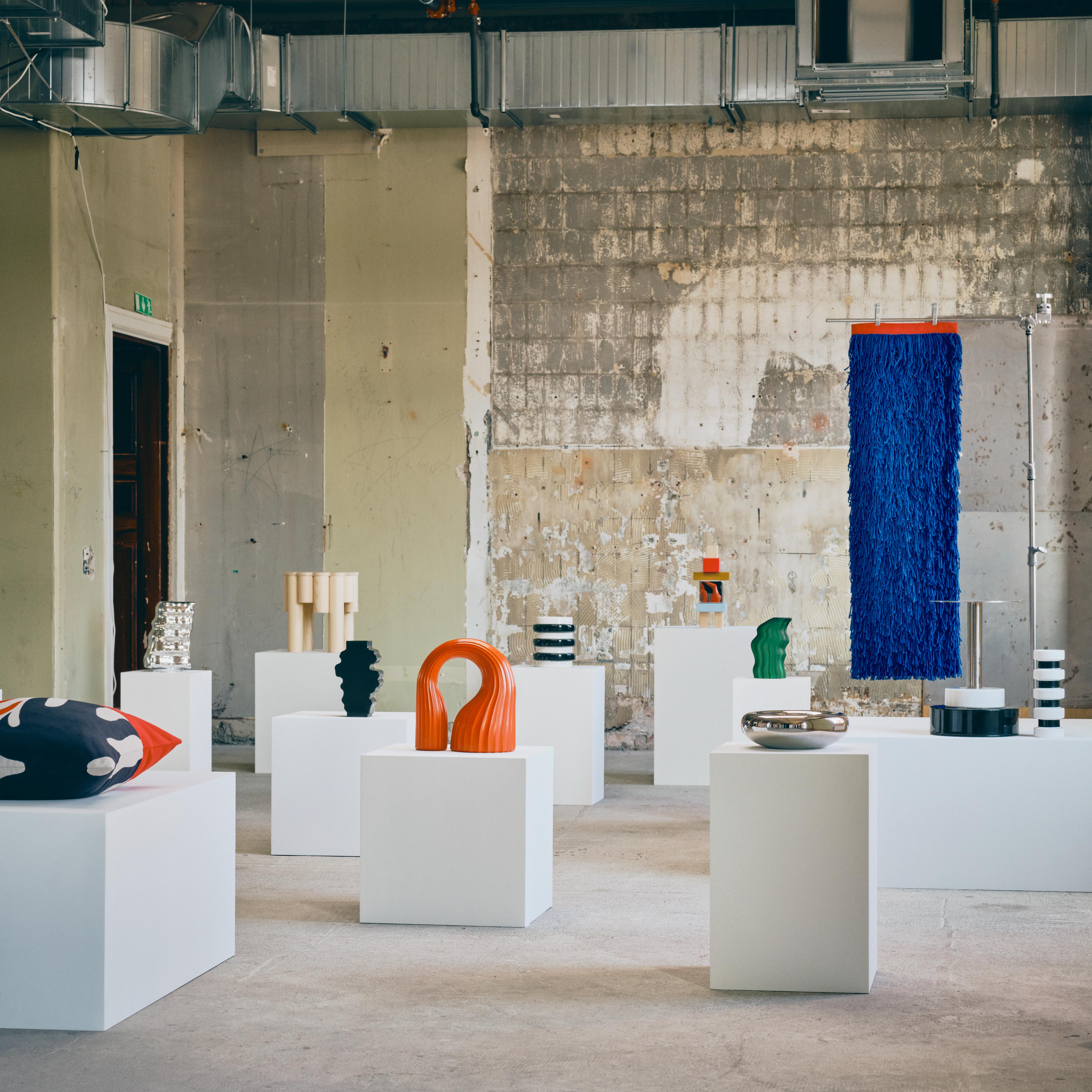 furniture and objects displayed on plinths