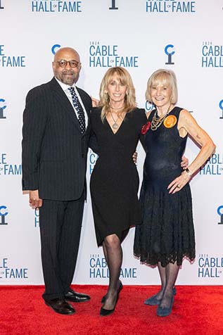 (From l.): Doug Holloway, president, Homewood Media; inductee Bonnie Hammer, vice chair, NBCUniversal; and Kay Koplovitz, founder of USA Network.