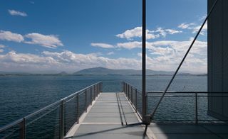 The glass and steel platform extending out over the bay of Santander