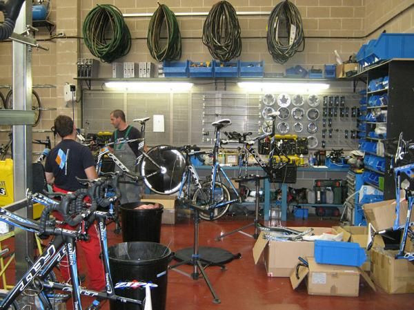The mechanics work on the bikes for the Vuelta