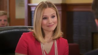 Kristen Bell smiling on Parks and Recreation.