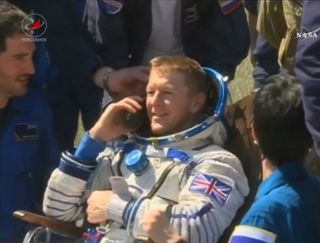 British astronaut Tim Peake makes call after returning to Earth aboard a Soyuz TMA-19M space capsule, which landed in Kazakhstan on June 18, 2016 to end a six-month flight to the International Space Station.