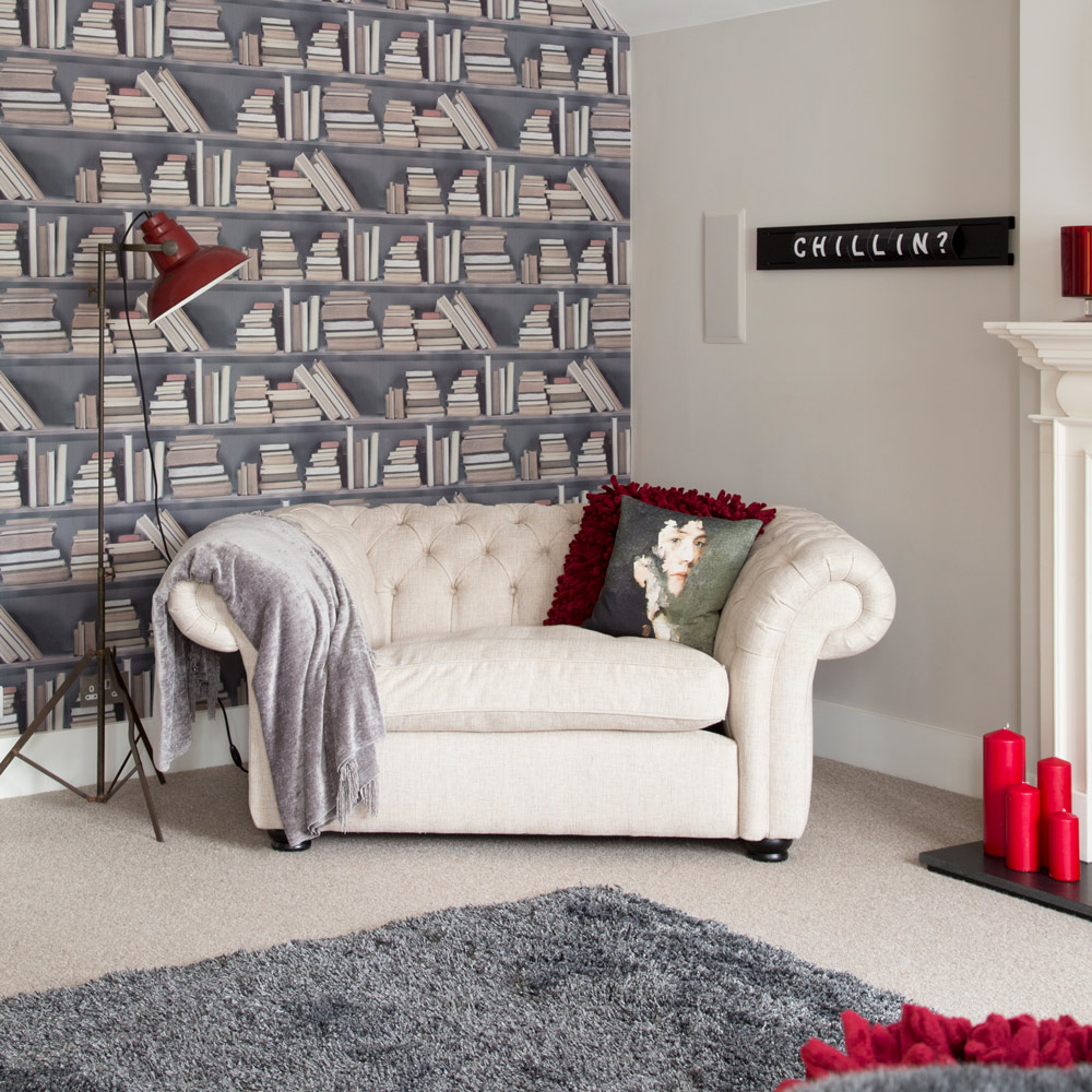 living room with white sofa and grey carpet