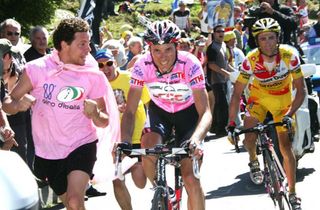 Maglia rosa Ivan Basso on the Passo di Mortirolo with Gilberto Simoni for company