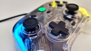 A close up photo of the GameSir T4 Kaleid controller on a white desk