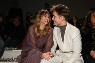 Robert Pattinson and Suki Waterhouse laughing