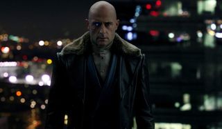 Shazam! Mark Strong standing on a rooftop as Dr. Sivana