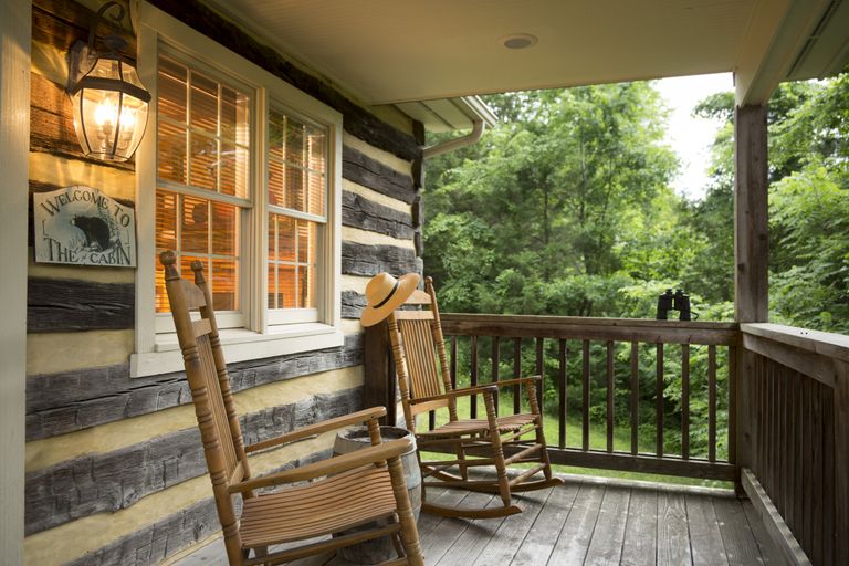 Porch Railing Ideas 10 Designs To Add Curb Appeal Homes Gardens - Log Cabin Front Porch Decorating Ideas