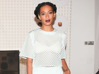 Solange Knowles in all white with purple lipstick at eBay's Future of Shopping event in NY
