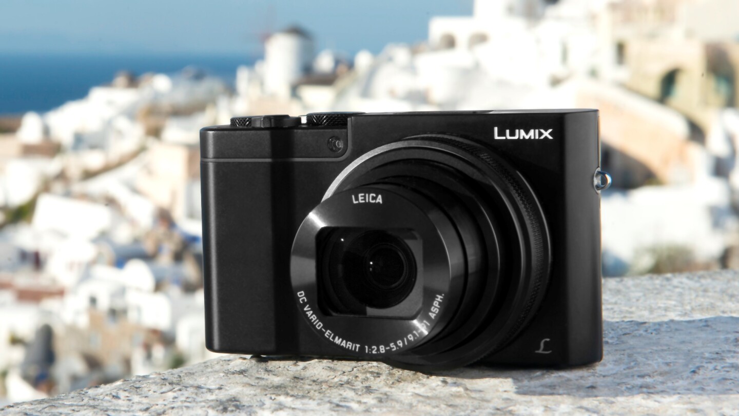 Panasonic Lumix ZS100 / TZ100 compact camera on stone wall outdoors
