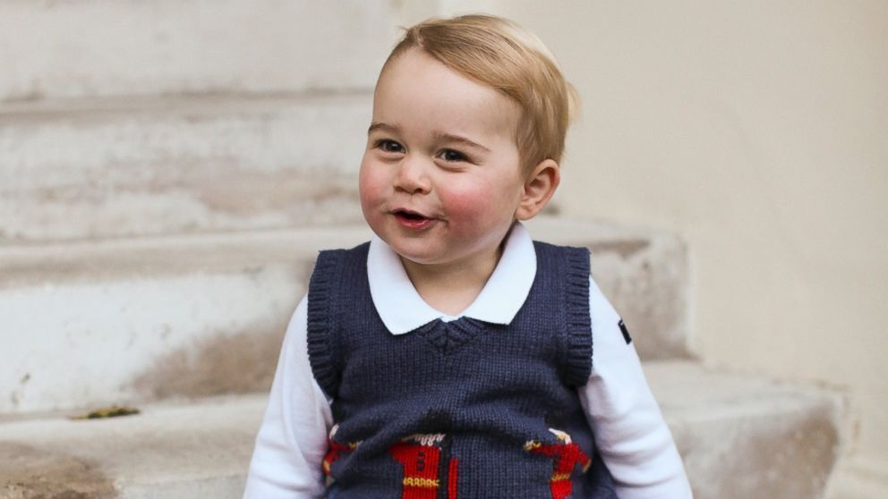 Prince George sitting on steps in November 2014