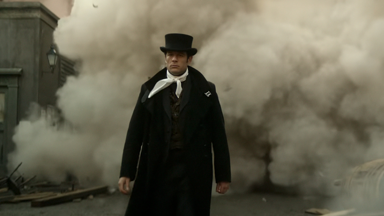 James Norton as Sean Rafferty walking away from an explosion in House of Guinness