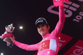 INEOS Grenadierss British rider Geraint Thomas celebrates his overall leaders pink jersey on the podium after the nineteenth stage of the Giro dItalia 2023 cycling race 183 km between Longarone and Tre Cime di Lavaredo rifugio Auronzo on May 26 2023 Photo by Luca Bettini AFP Photo by LUCA BETTINIAFP via Getty Images
