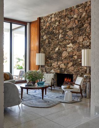 Small living room with stone fireplace