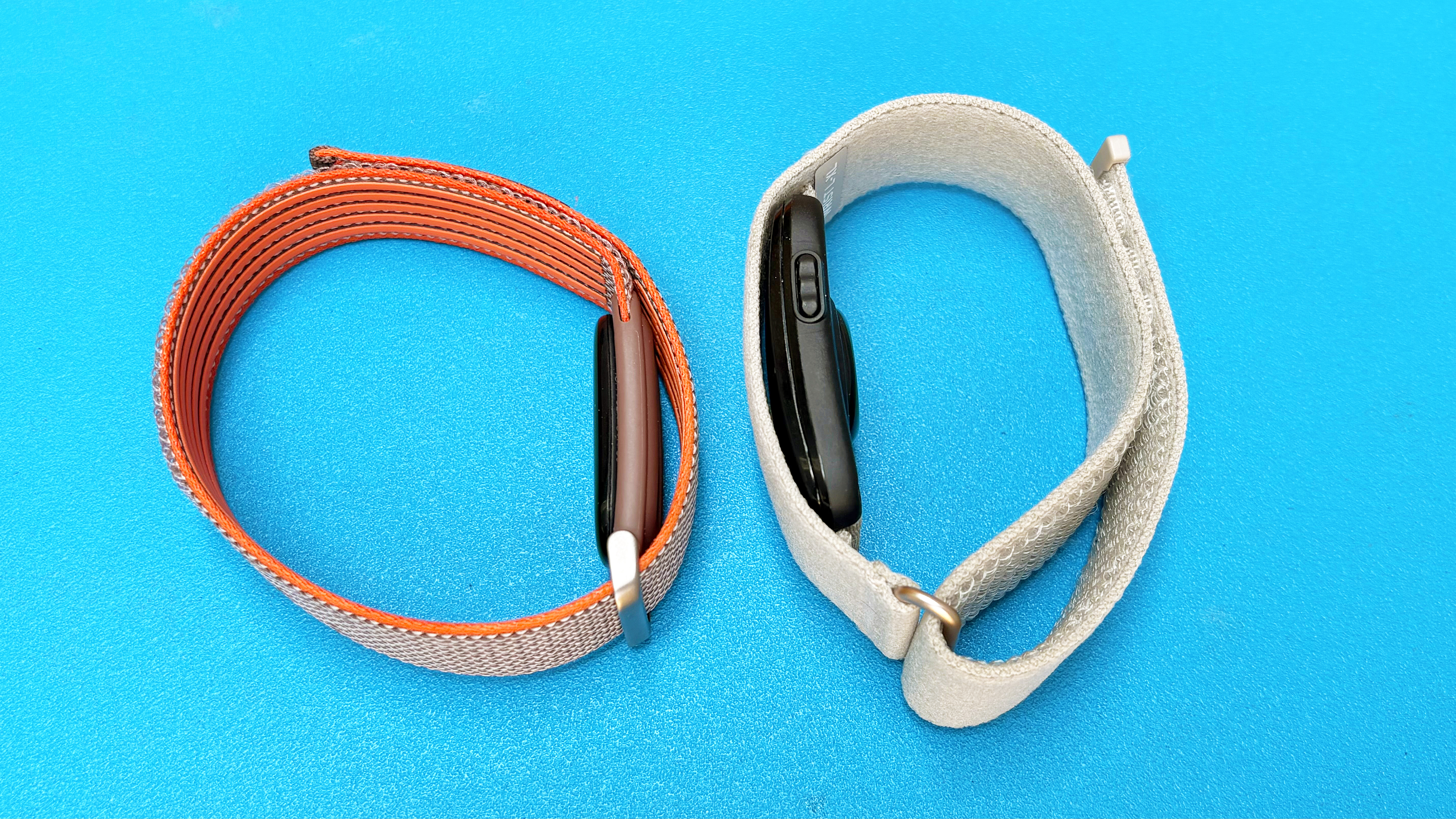 Close-up of the Fitbit Air next to the Garmin Cirqa