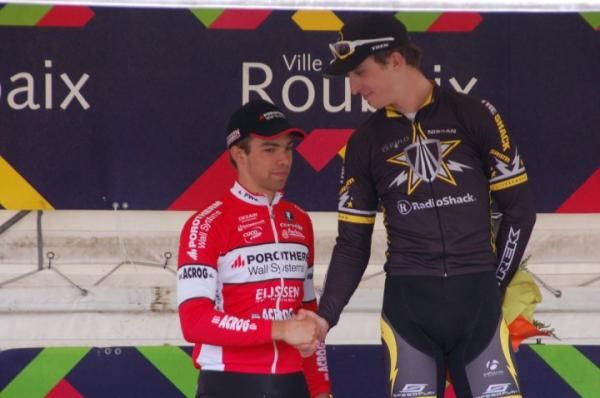 Jens Debusschere (Pws-Eijssen Cycling Team) is congratulated by Taylor Phinney