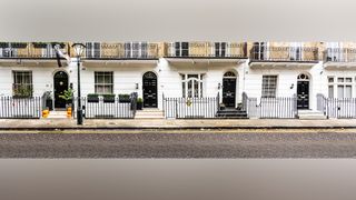 A panorama image, showing a house row from the front with no distortion 