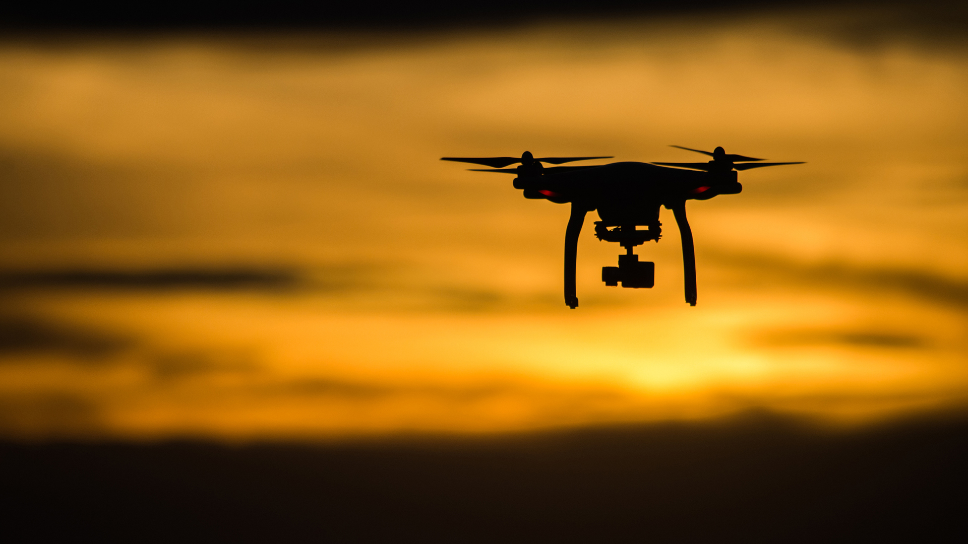 Images of drones store at night