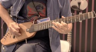 Paul Riario demos the Donner Hush-I Silent guitar