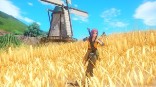 The Hero of Dragon Quest 11 runs through a field of wheat