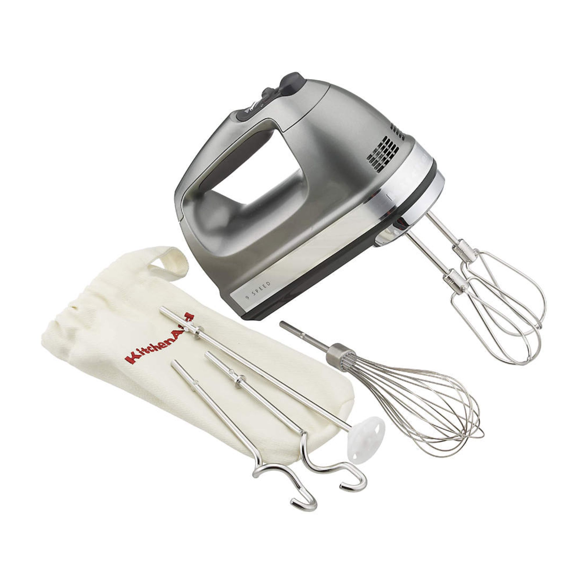 Silver KitchenAid hand mixer with dough hook and whisk attachments, plus branded canvas bag