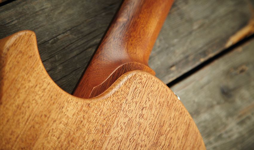There's a strong hint of Huber-like style to the neck joint on this Halfbreed model