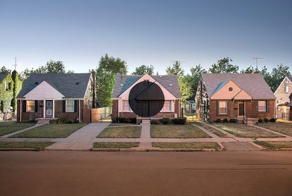 Ian Strange artistically defaced abandoned houses across the United States.