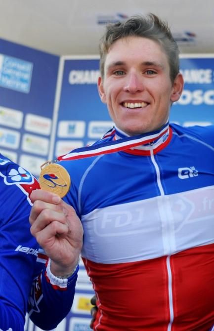 Arnaud Demare shows off his gold medal