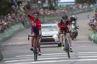 Lachlan Norris celebrates his narrow victory over Brent Bookwalter (BMC)