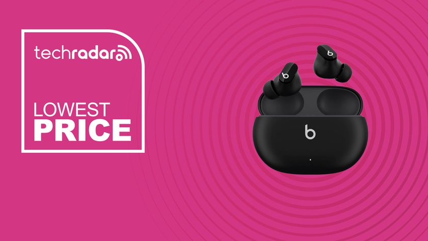 The Beats Studio Buds on a pink background with text saying Lowest Price.