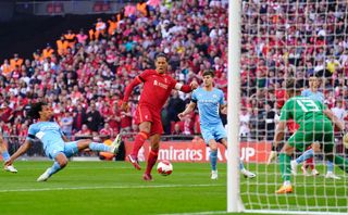 Virgil Van Dijk in action against Manchester City