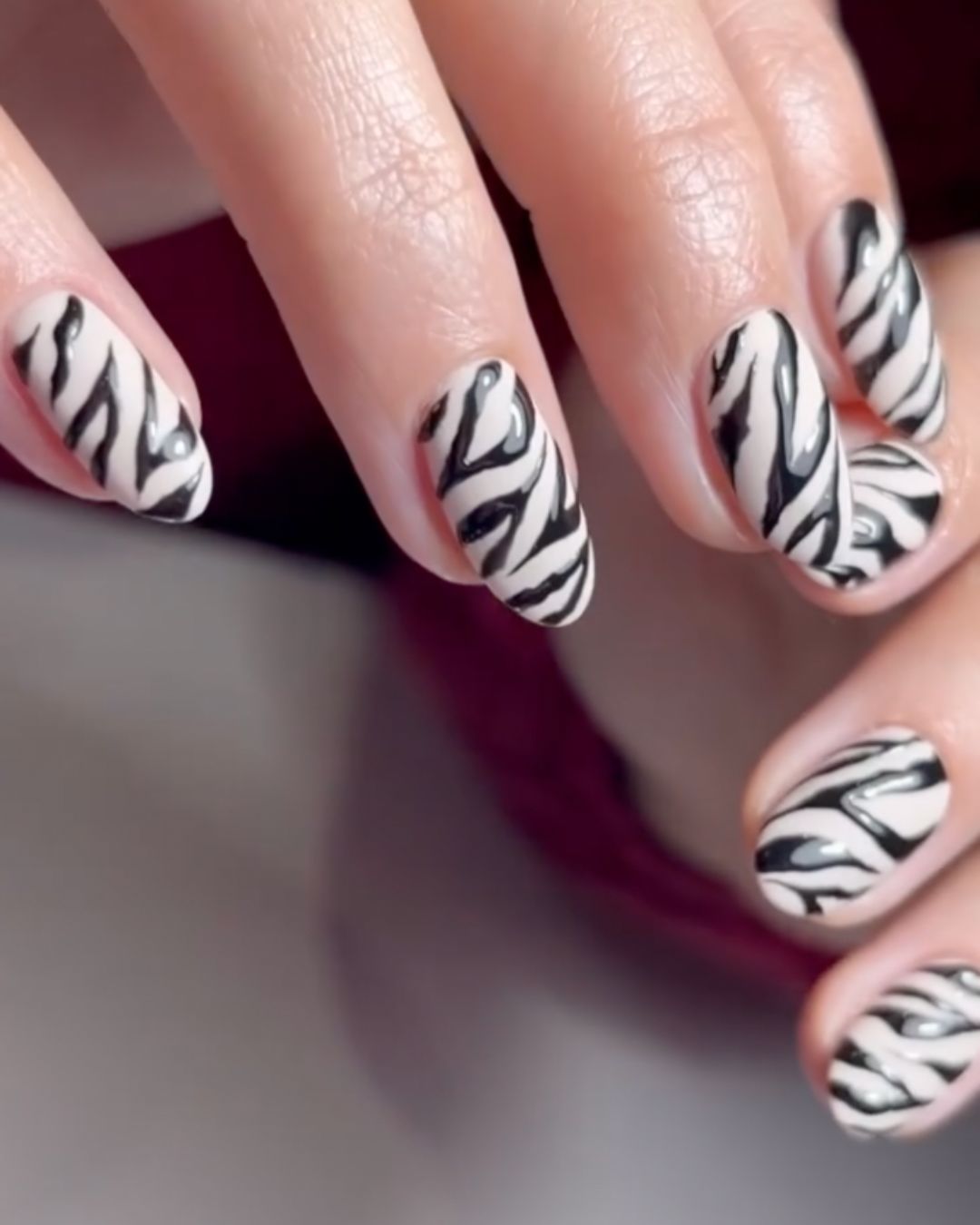 Classic black and white zebra nails.