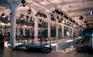 S/S 2006 womenswear: Mirrors, chromes, pearlescent lighting and brushed metal seating consoles illuminated the brand's Spring collection