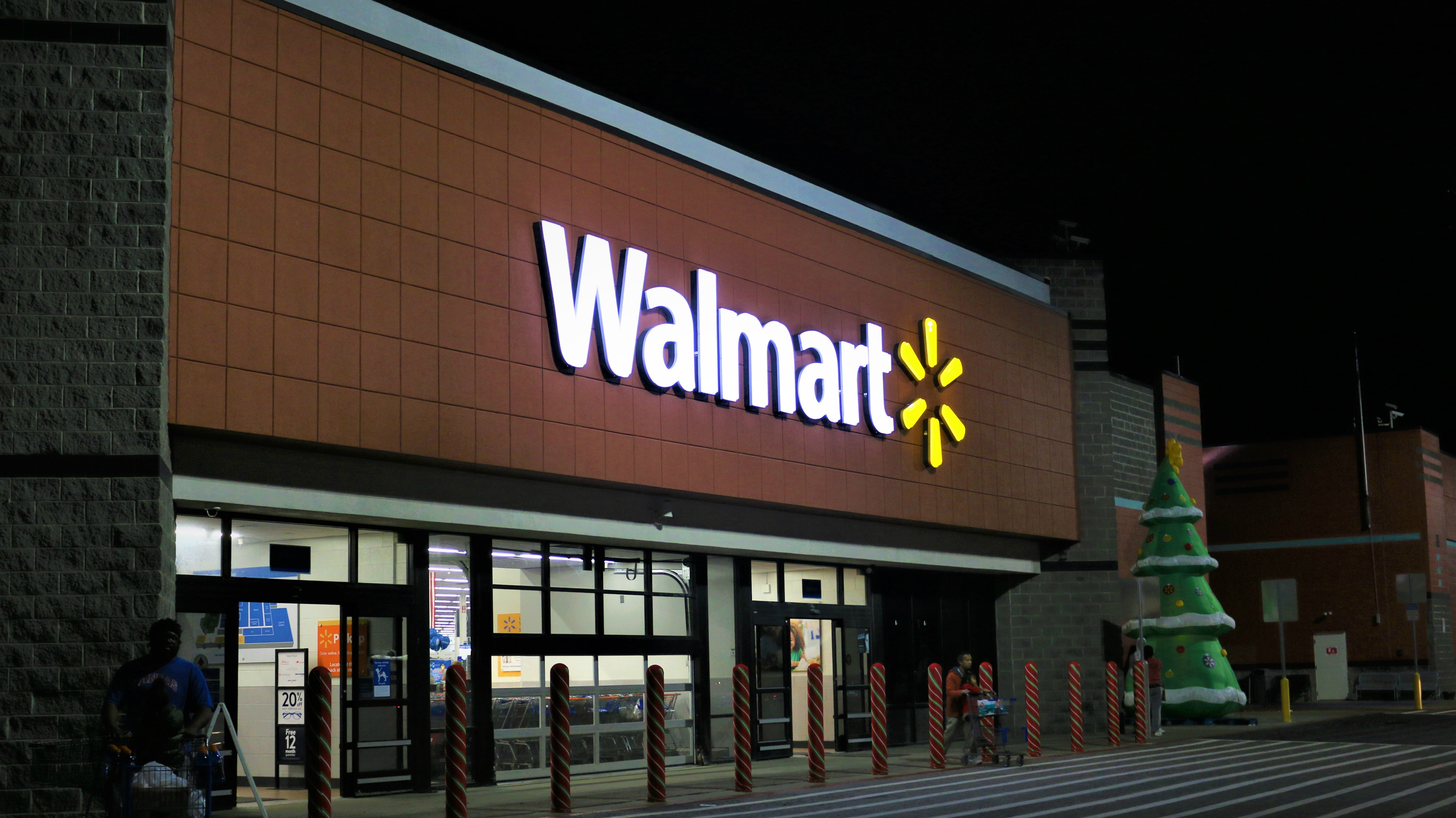 An image of a Walmart store at night