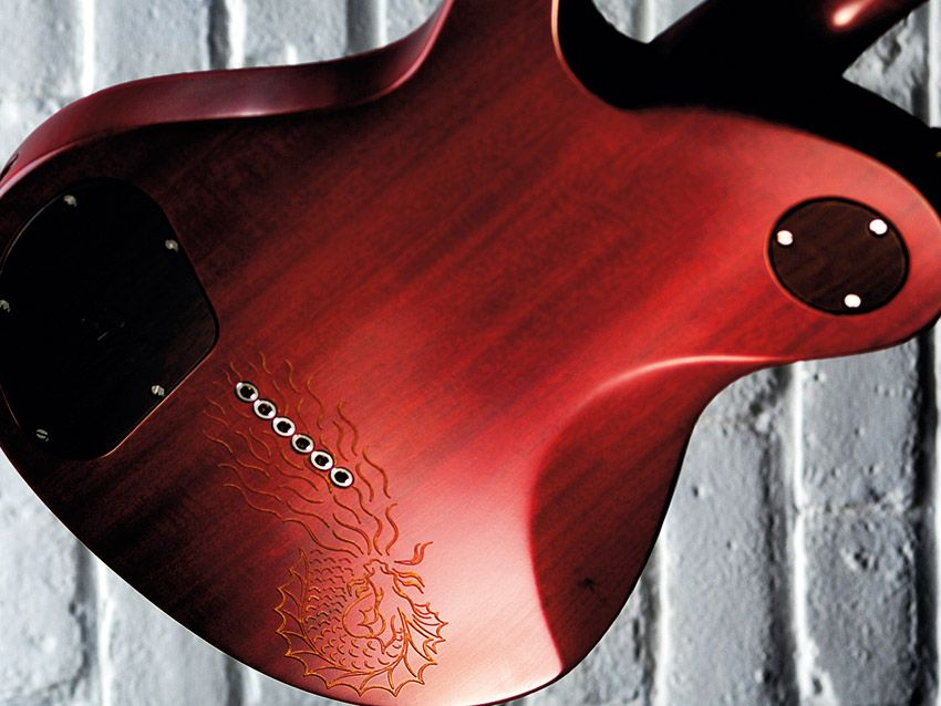 The dragon 'Tattoo' engraving on the back is a nice custom touch.